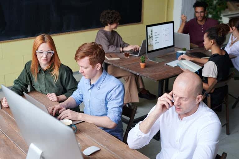 Photo Of Man In Front Of Computer