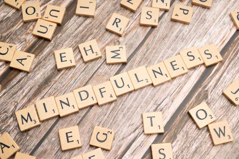 The word mindfulness spelled out with scrabble tiles